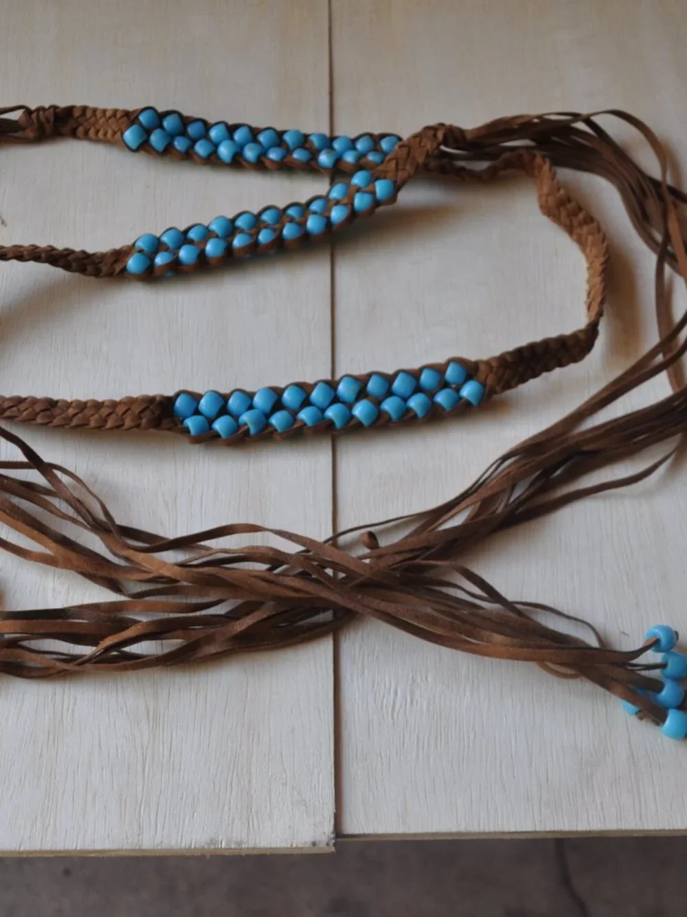 Belt Women's Bohemian boho-style belt features brown braided leather straps
